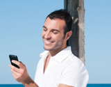 man_telefoon_strand160.jpg